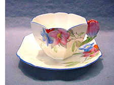 Shelley queen anne flower handle cup and saucer syringa pattern